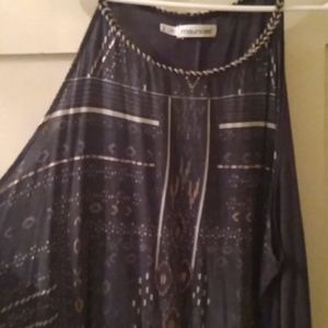 Tunic length blouse with metallic tribal print